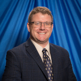 Joe Gallagher , President